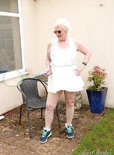 Sexy naked glasses granny showing off in her backyard